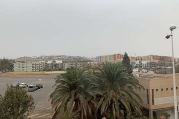 Melenara, con mucha y poca calima (Foto TA)